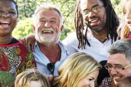 A group of multi-generational people grouped together